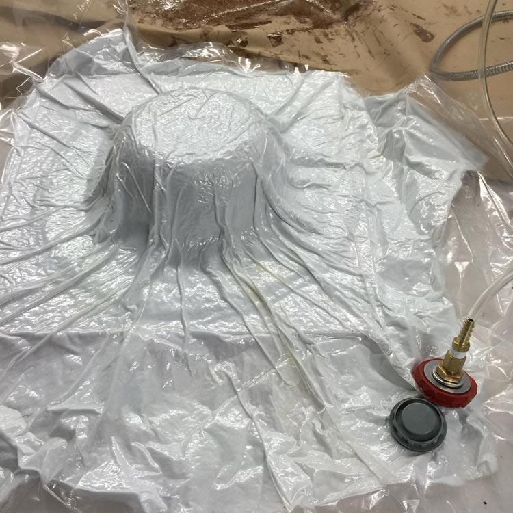 Seal the entire composite in a vacuum bag for 4 hours.