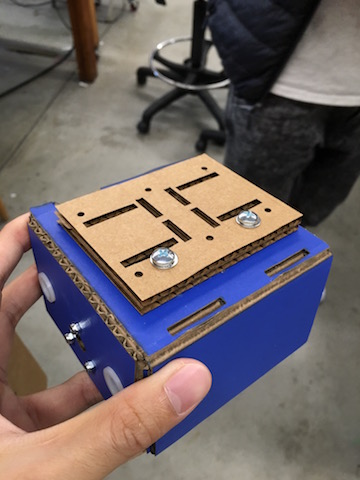 The blue box with screws