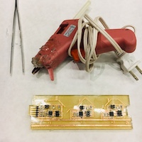 using a glue gun with a circuit board
