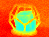 Looping image of a rotating cube inside a dodecahedron frame going from an orange hue to a shade of lime green