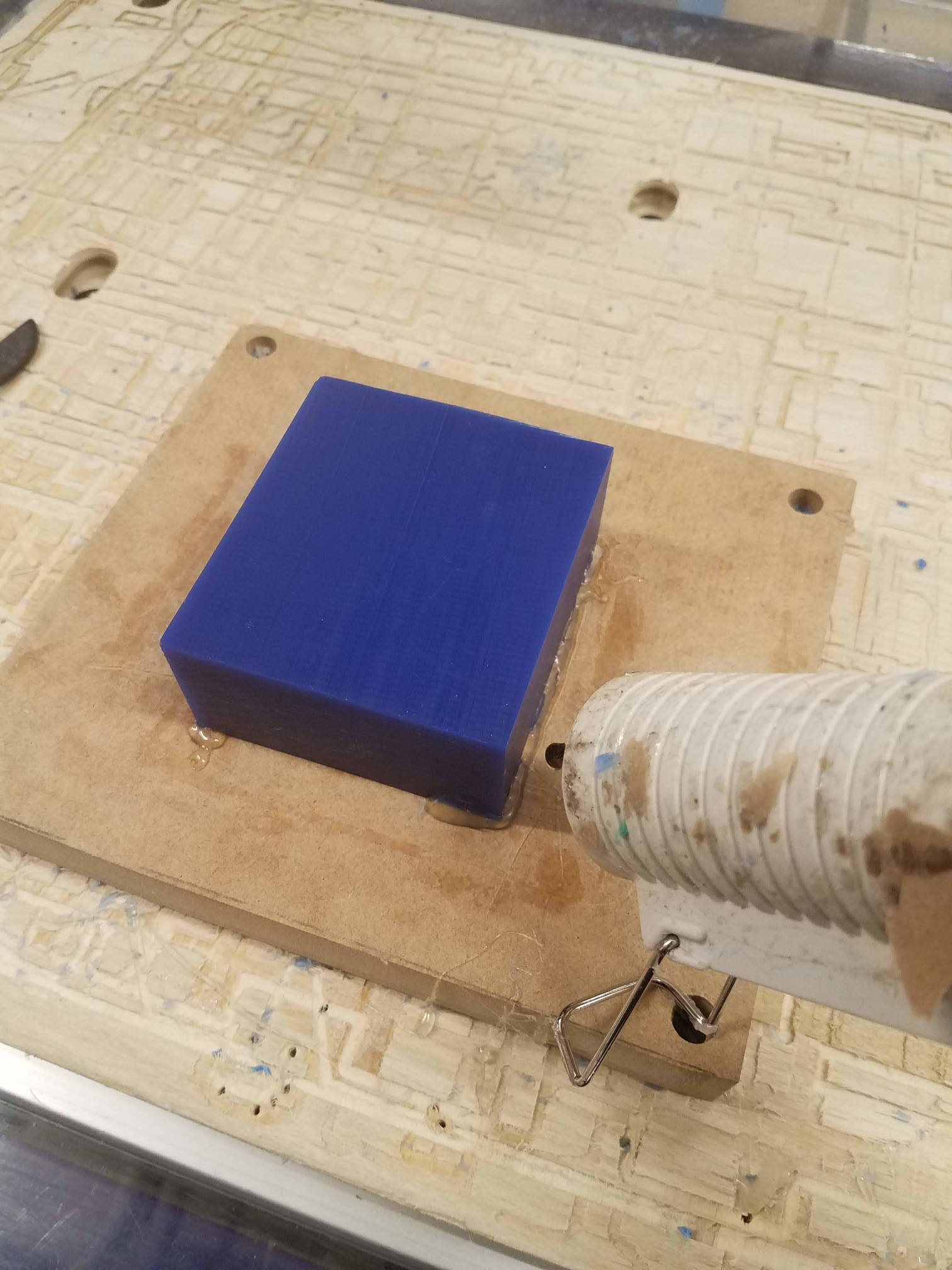 Gluing the block down
