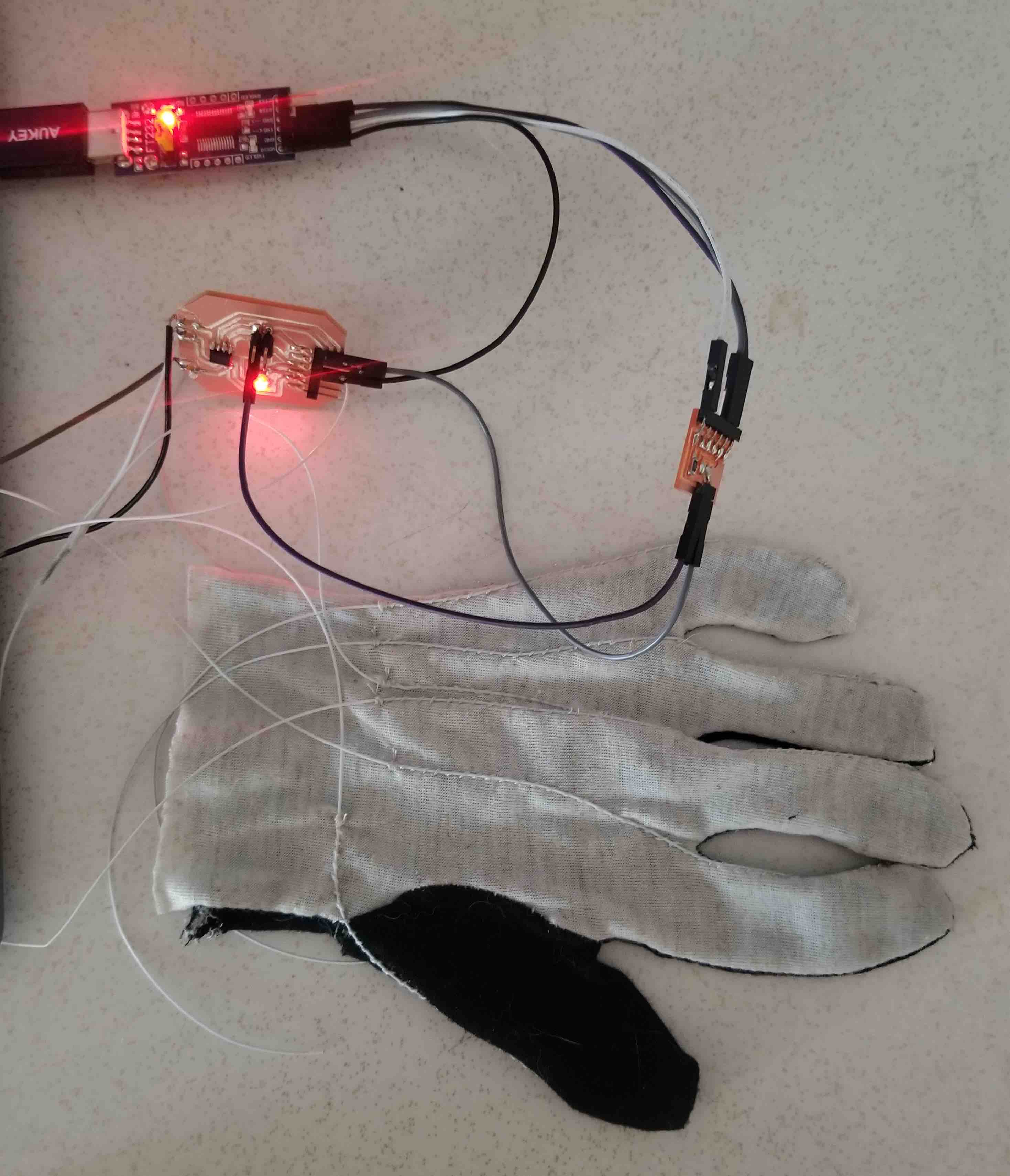 Integrated glove and circuit.