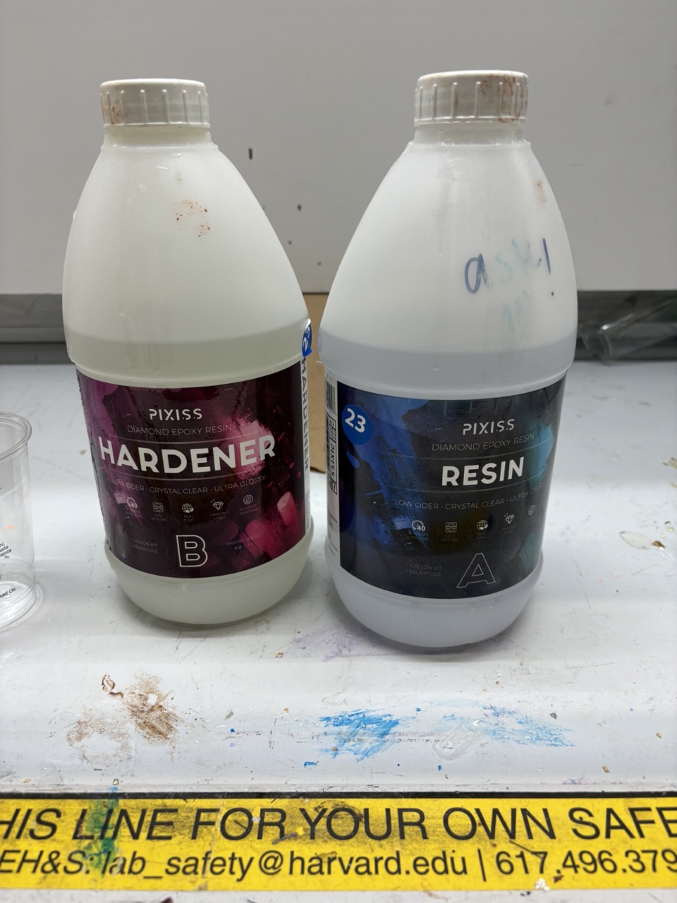A jug of resin and of hardener