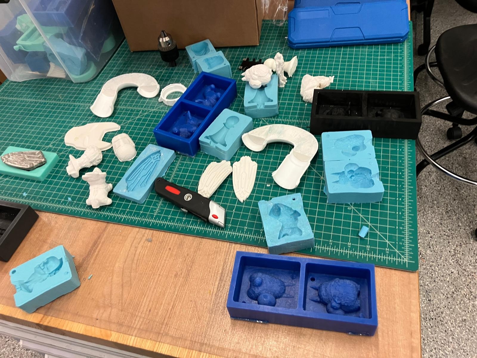 Team preparing molding and casting materials