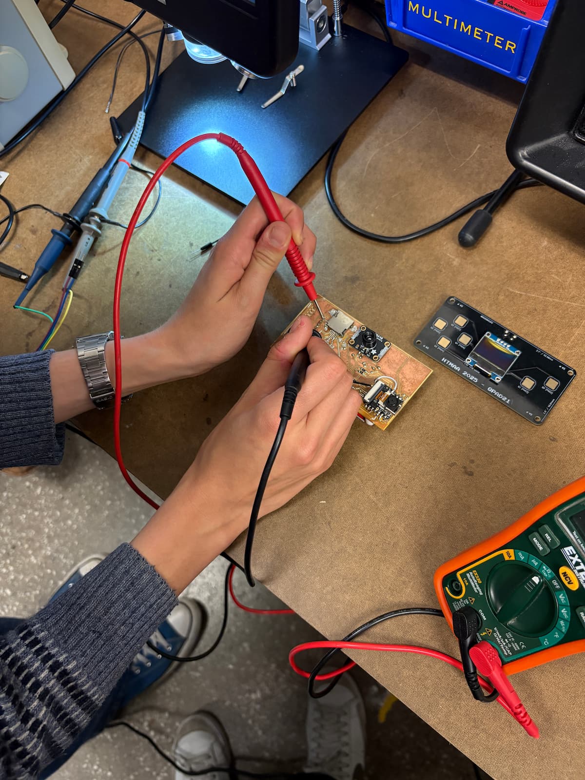 Carlotta using multimeter