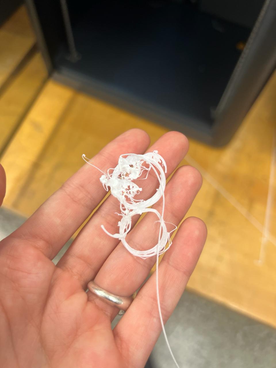 Failed print with spaghetti-like extrusion