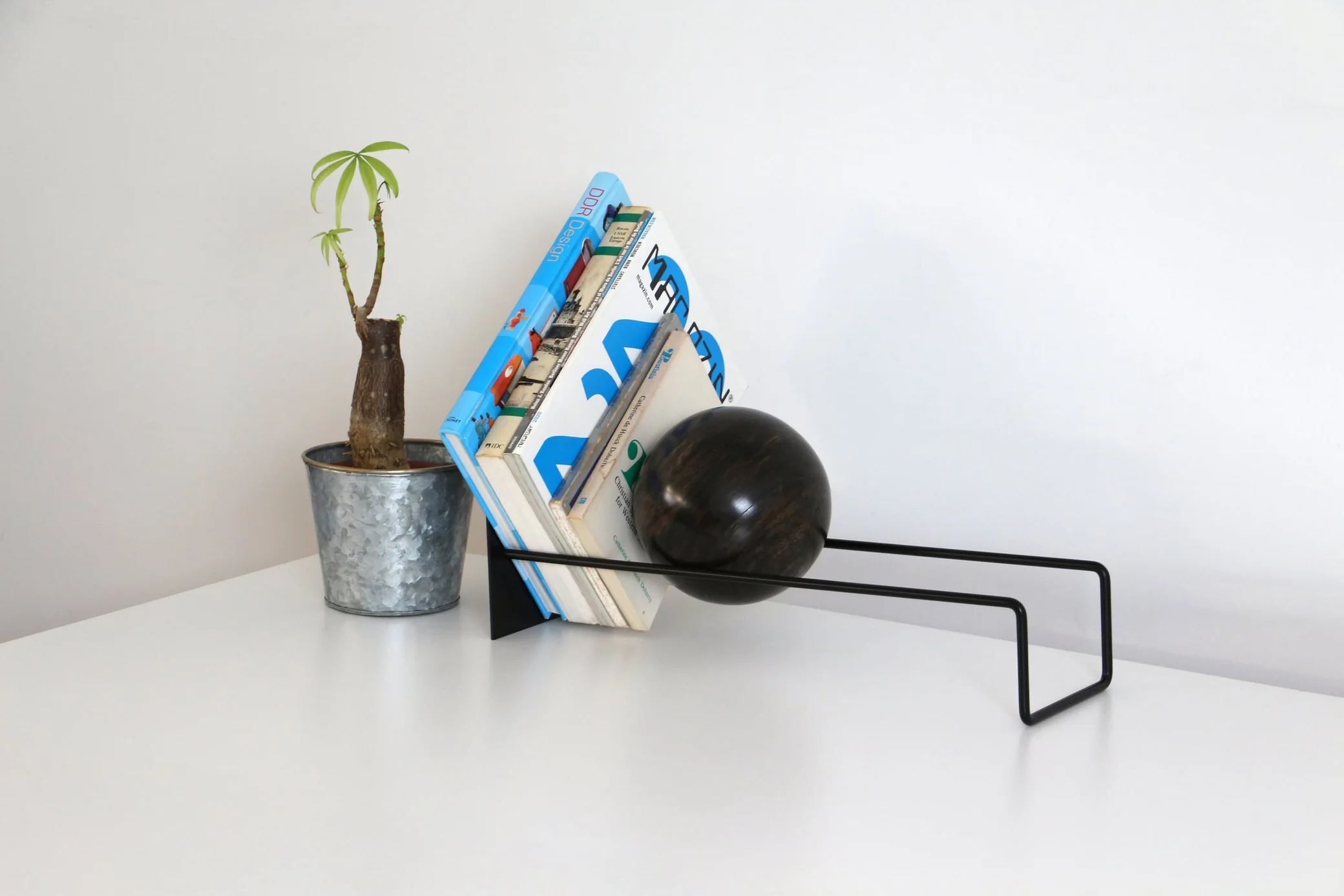 Image credit: https://stackedstore.com/products/detail-slope-bookend