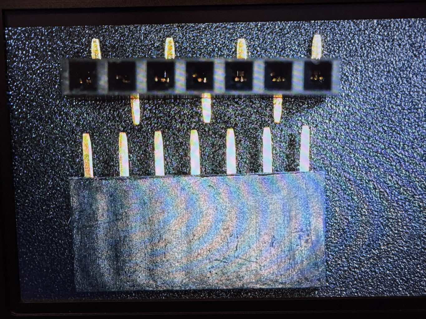 Bent and unbent female socket pins.