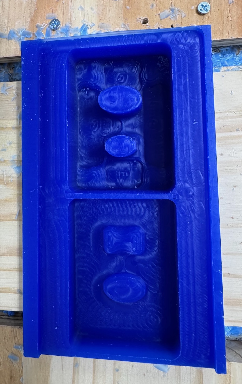 After roughing with \(\frac{1}{4}\) and \(\frac{1}{8}\) flat end mills.