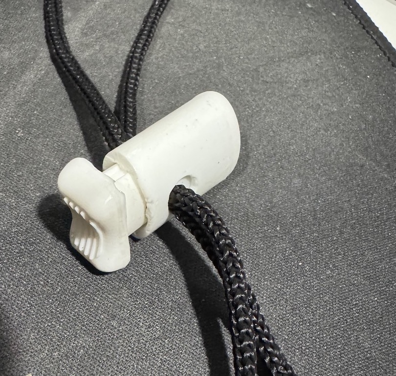 Testing cinching function with cord.