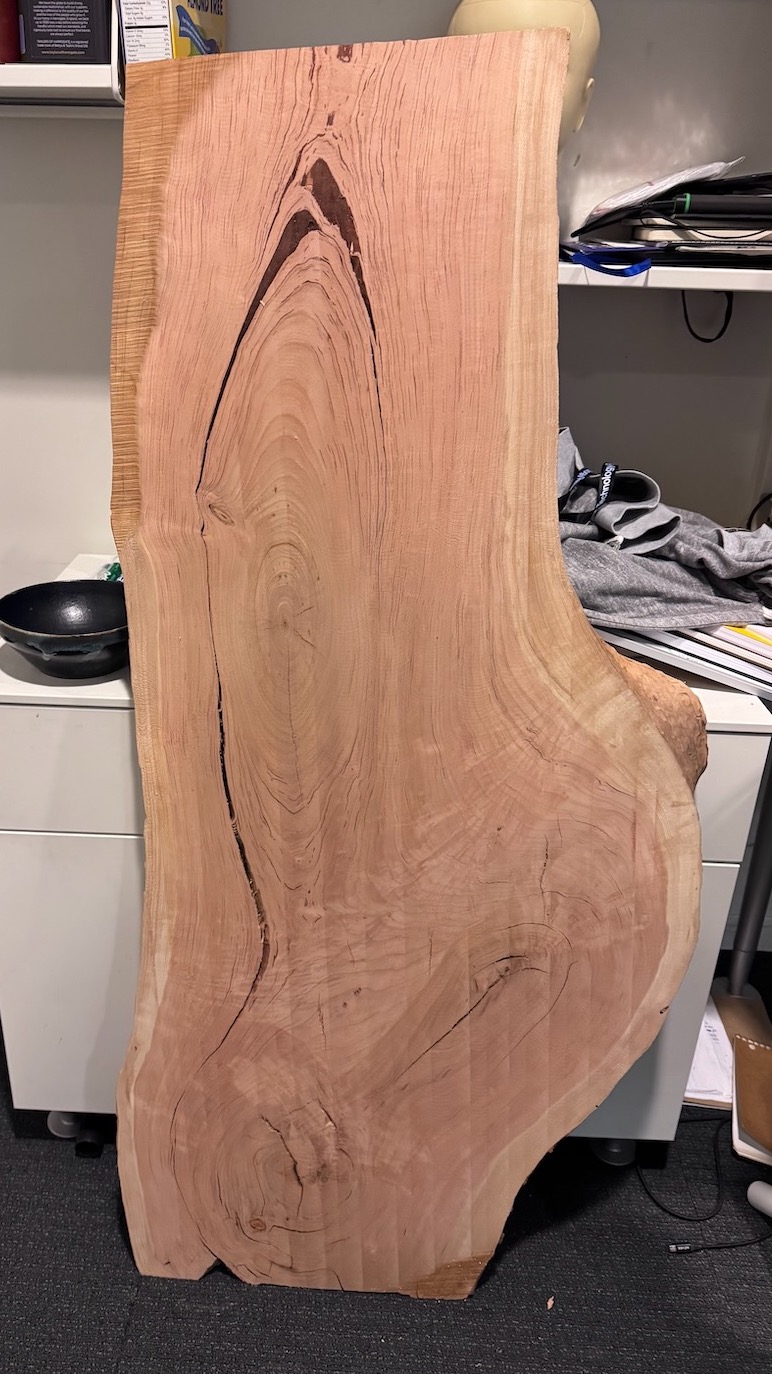Cherry wood slab after surfacing. Some part left rough to preserve overall thickness.