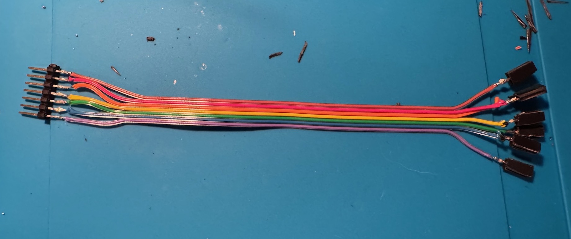 Soldered pins to ribbon cable.