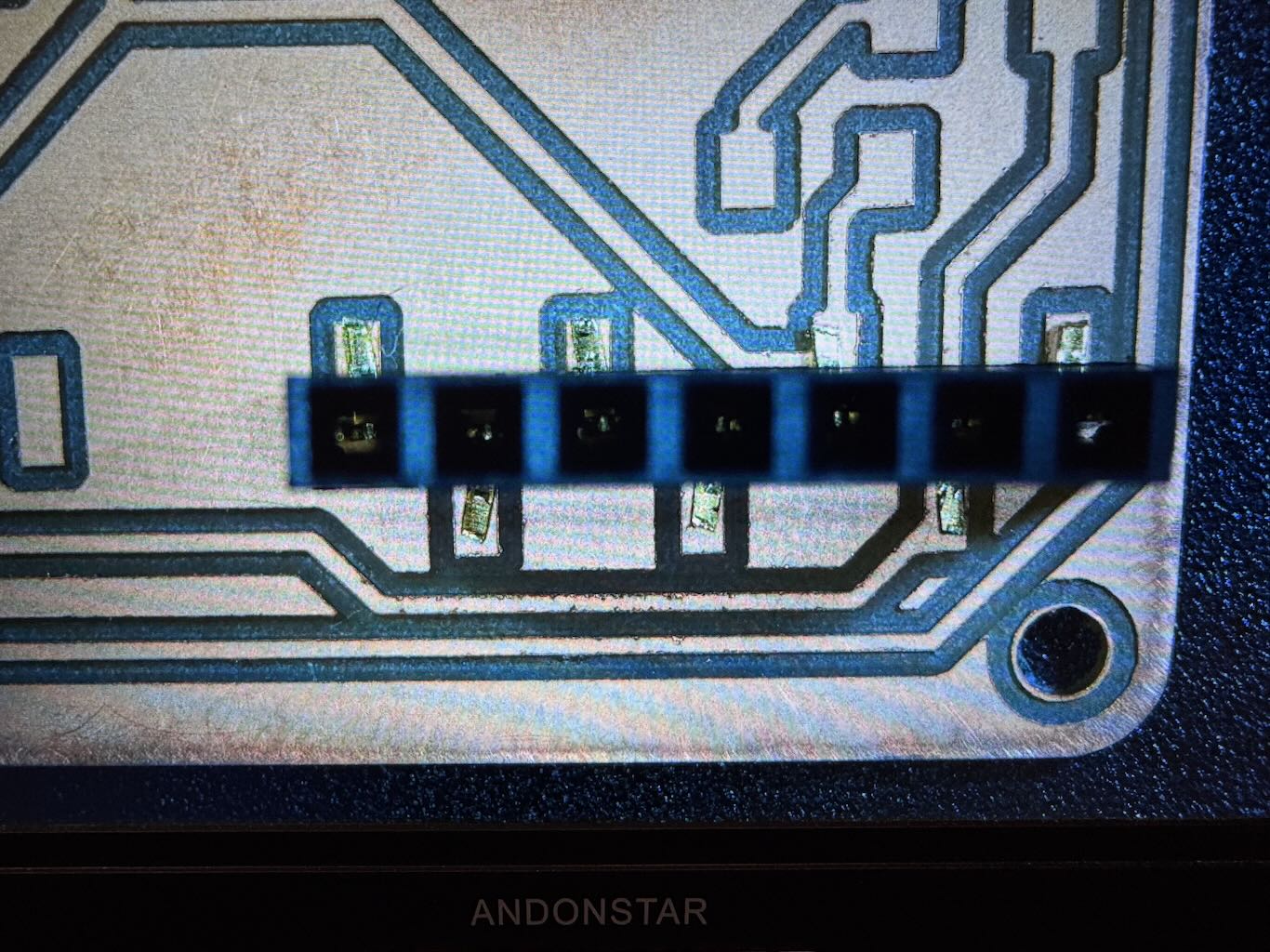 Snipped ends of pins to match pad size.
