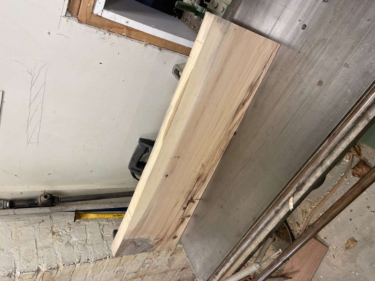 Using the joiner to plane a short side once the face is flat