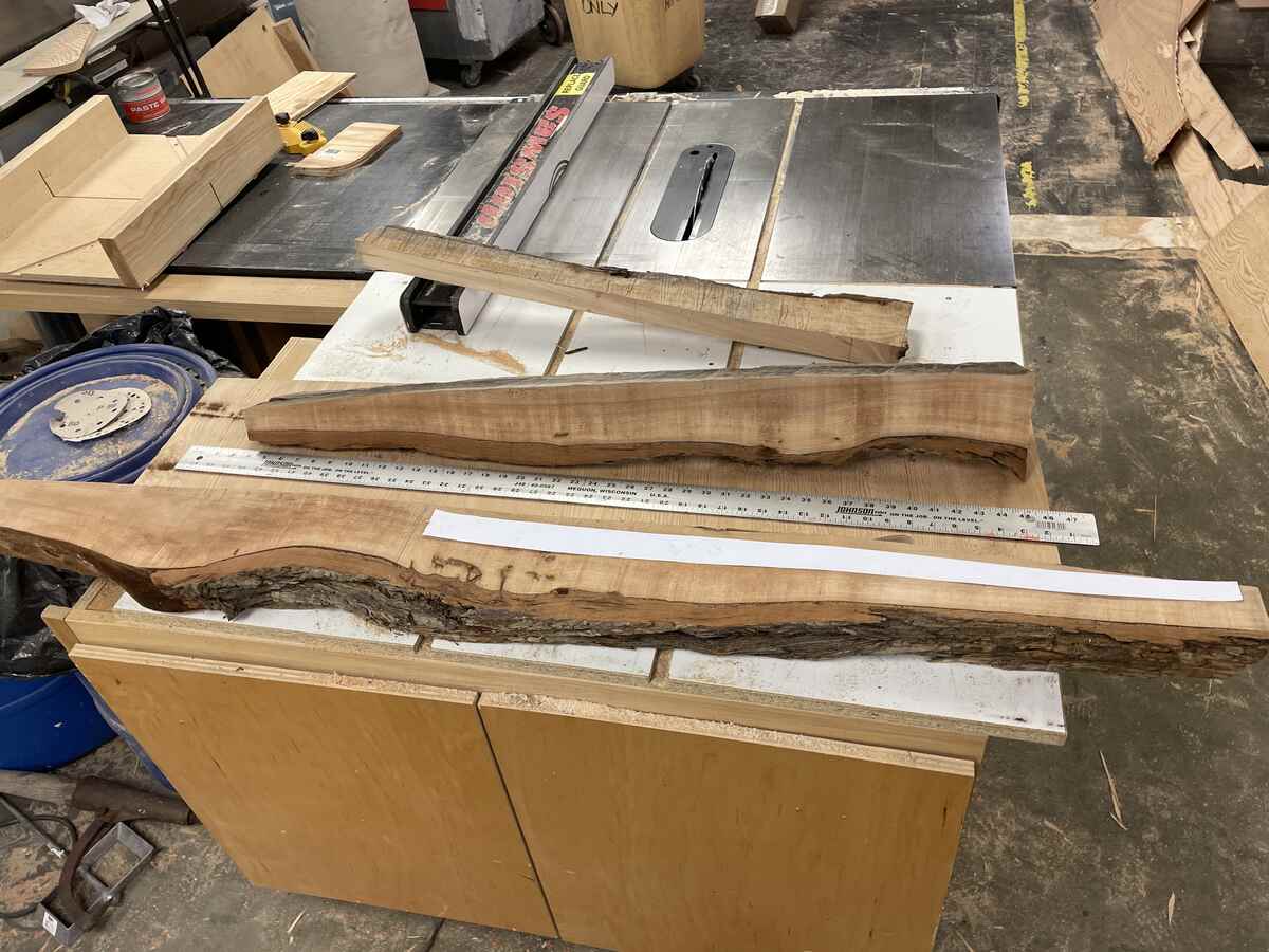 Finding where a leg would fit in the rough slices of the log