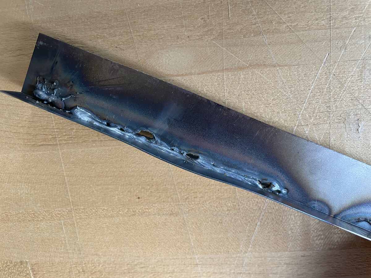 Welding with too high a volatage will cause it to burn through the material