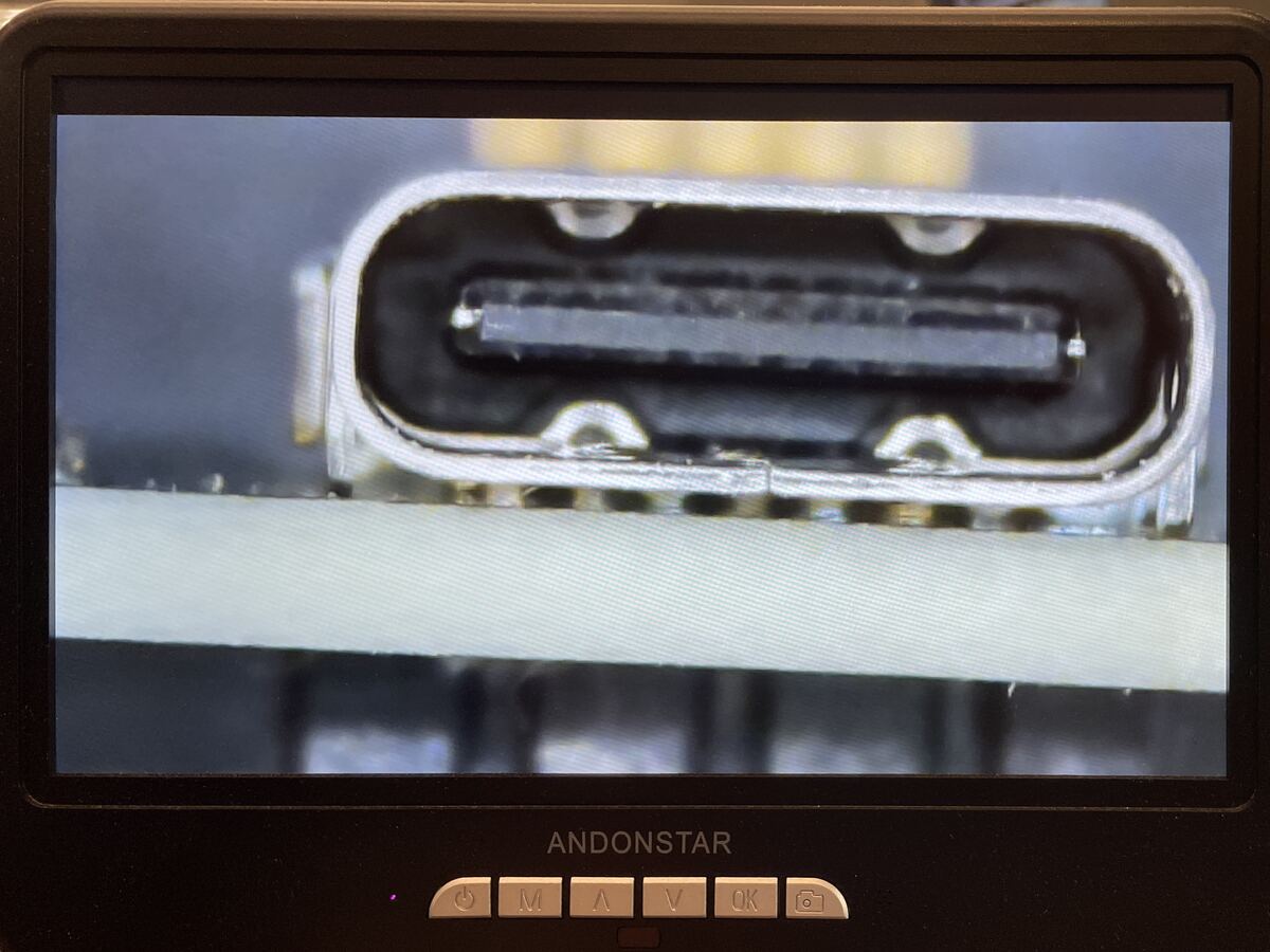 Inspecting the USB-C connection with a microscope
