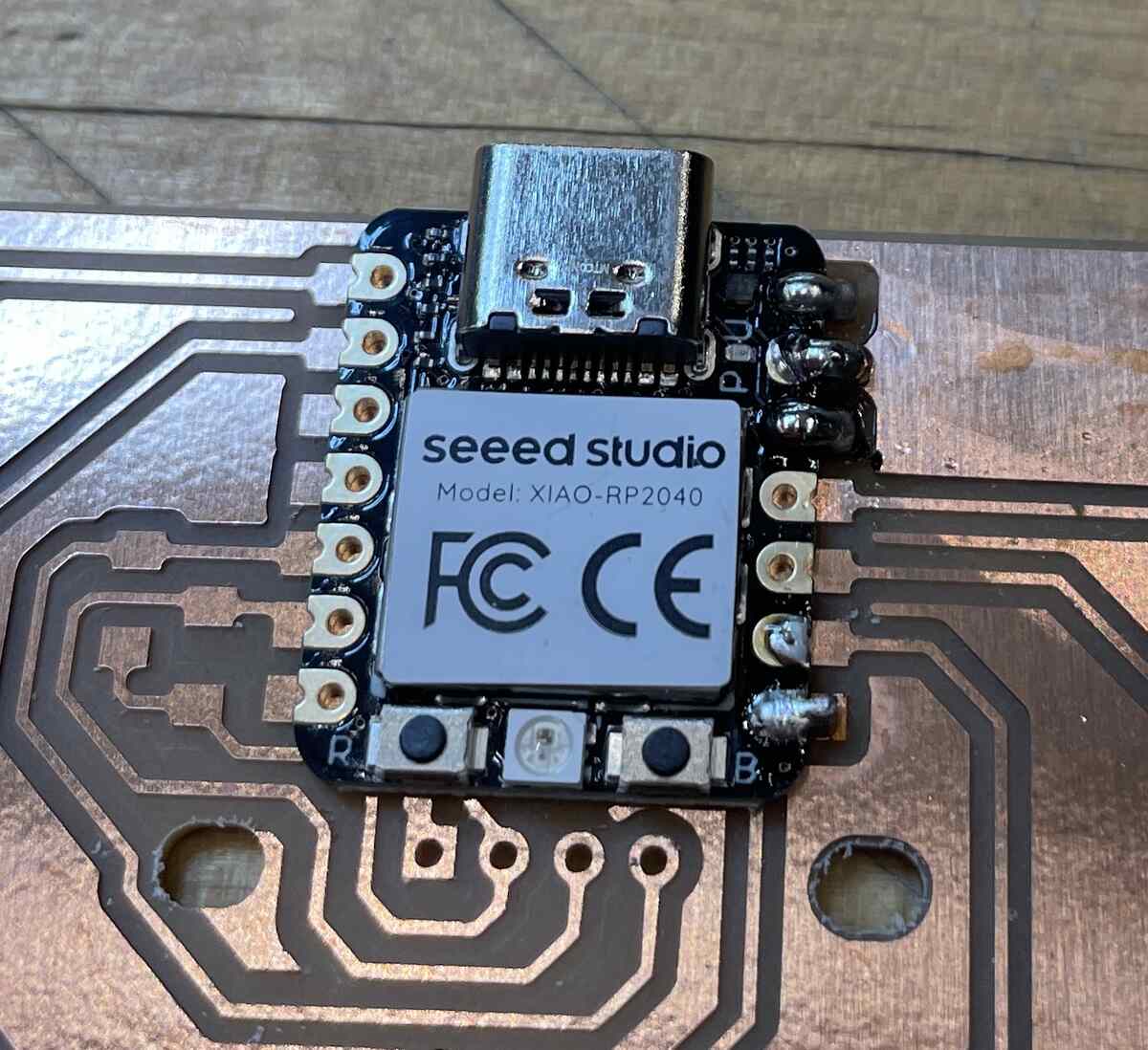 Pinning the XIAO down with one solder