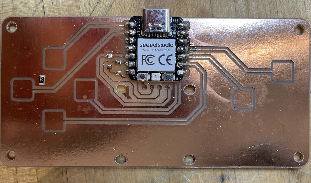 Tining all the contacts for the resistors and soldering the chip