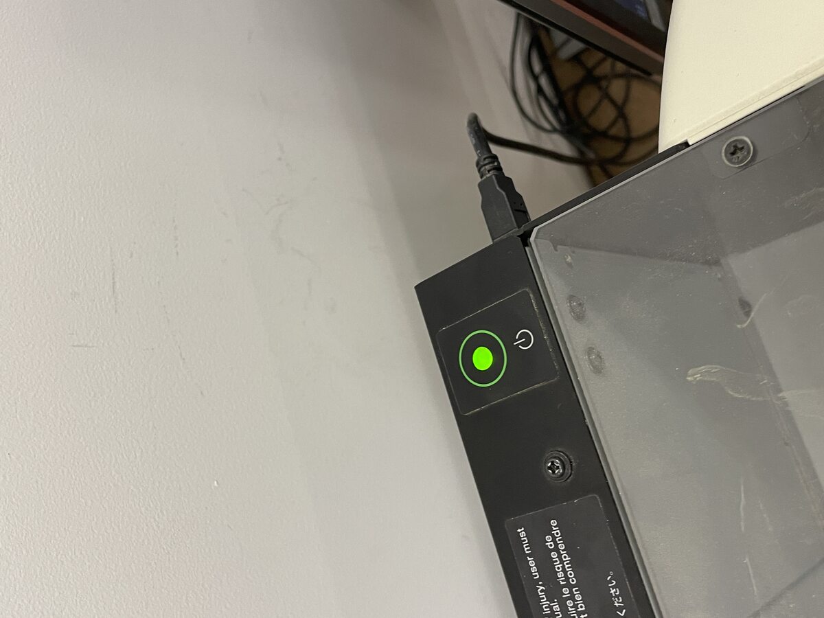 I had to turn the machine on and off by pressing this button a few times because if I opened the door when it is running a command, it will have a blinking light and not want to continue.