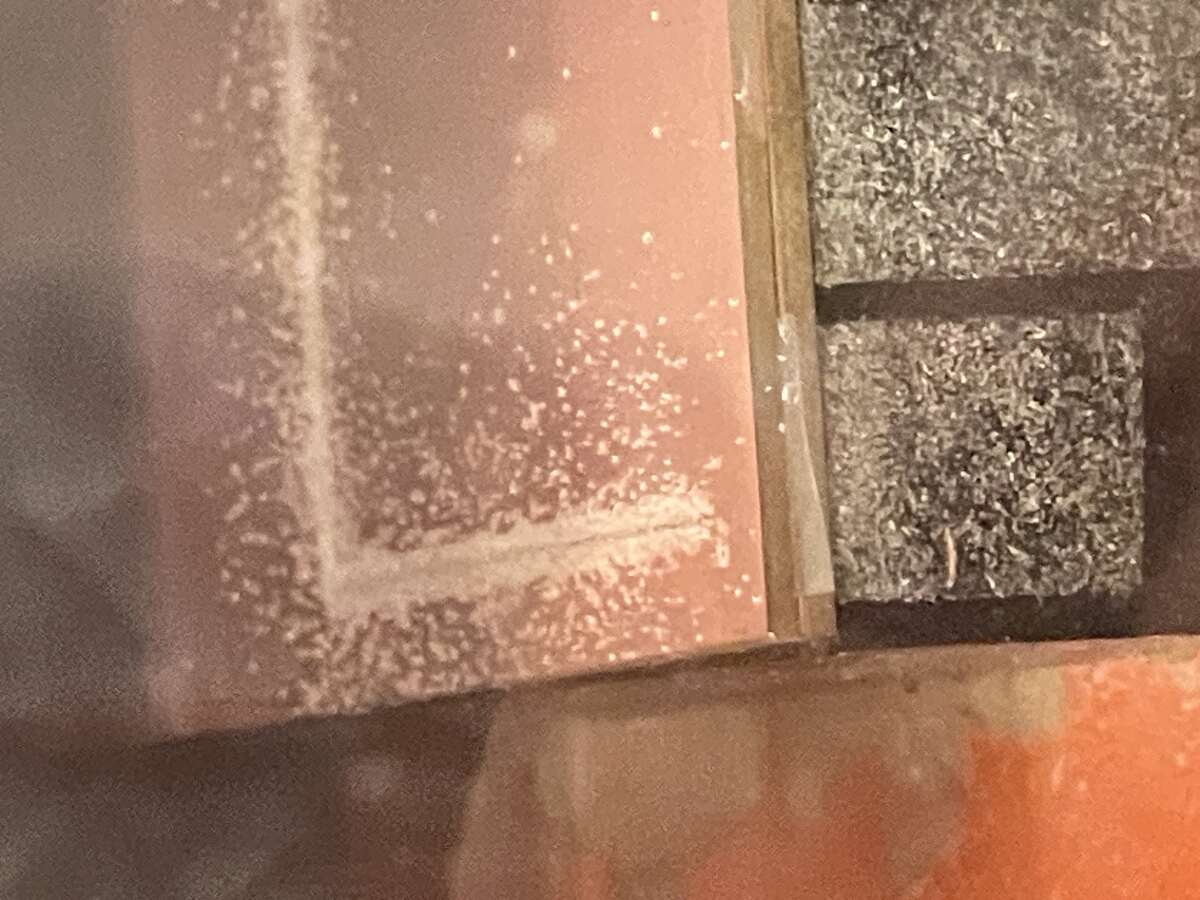 Starting to cut the copper traces. This seemed to be the right amount of "chipping" residue according to Gert and means things are running smoothly.