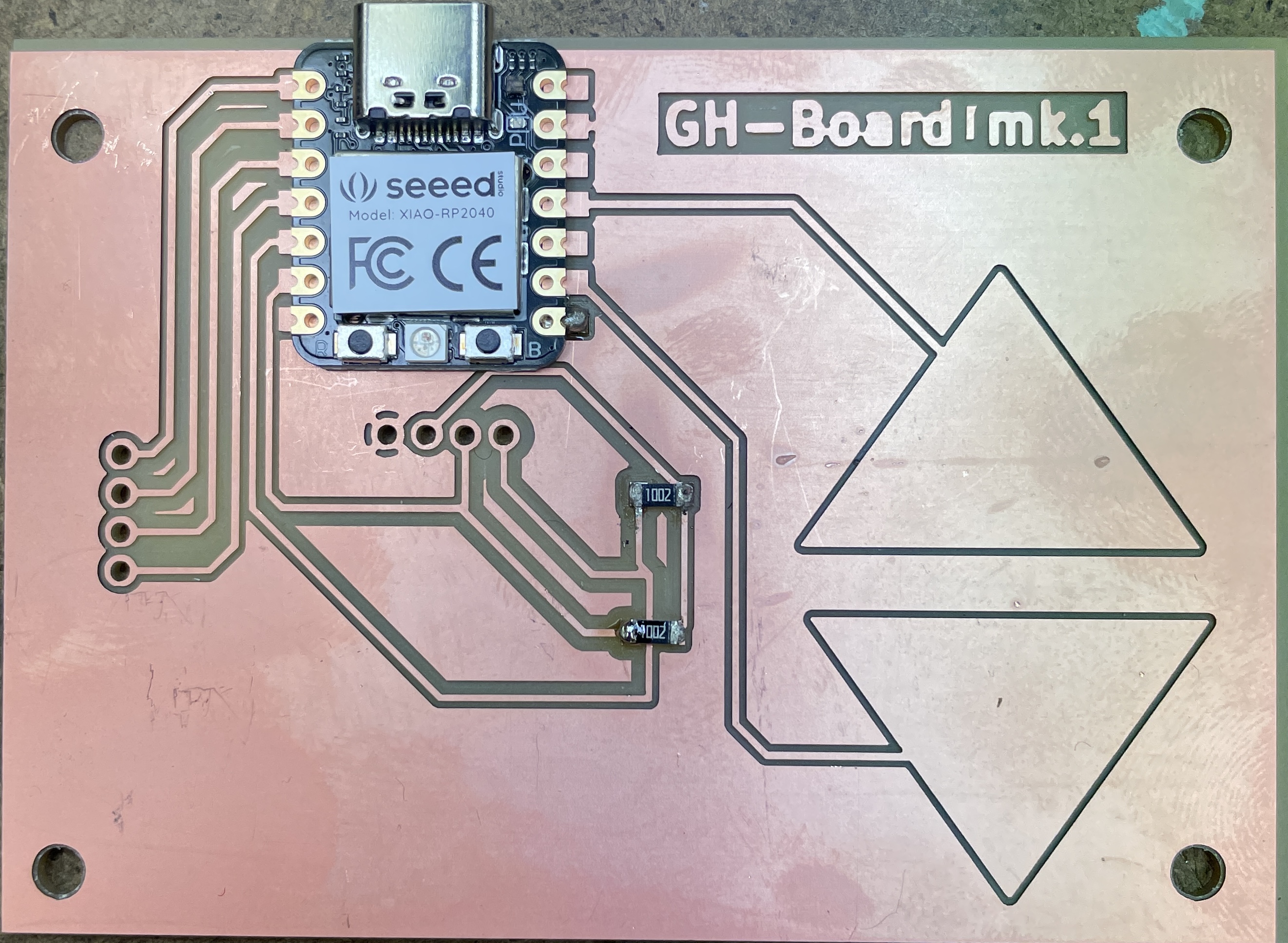 Placing the XIAO down with just one pin