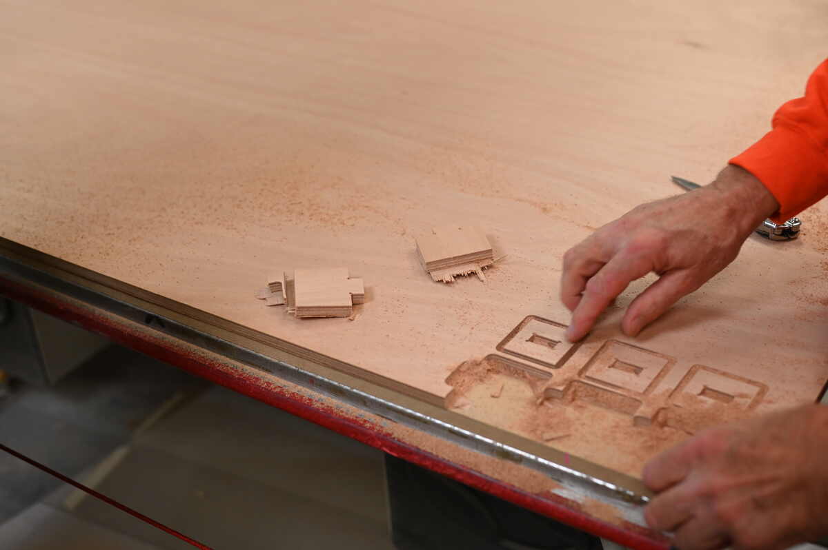 Removing the pieces. Note the "onion skin" edges at the bottom that need to be removed by hand