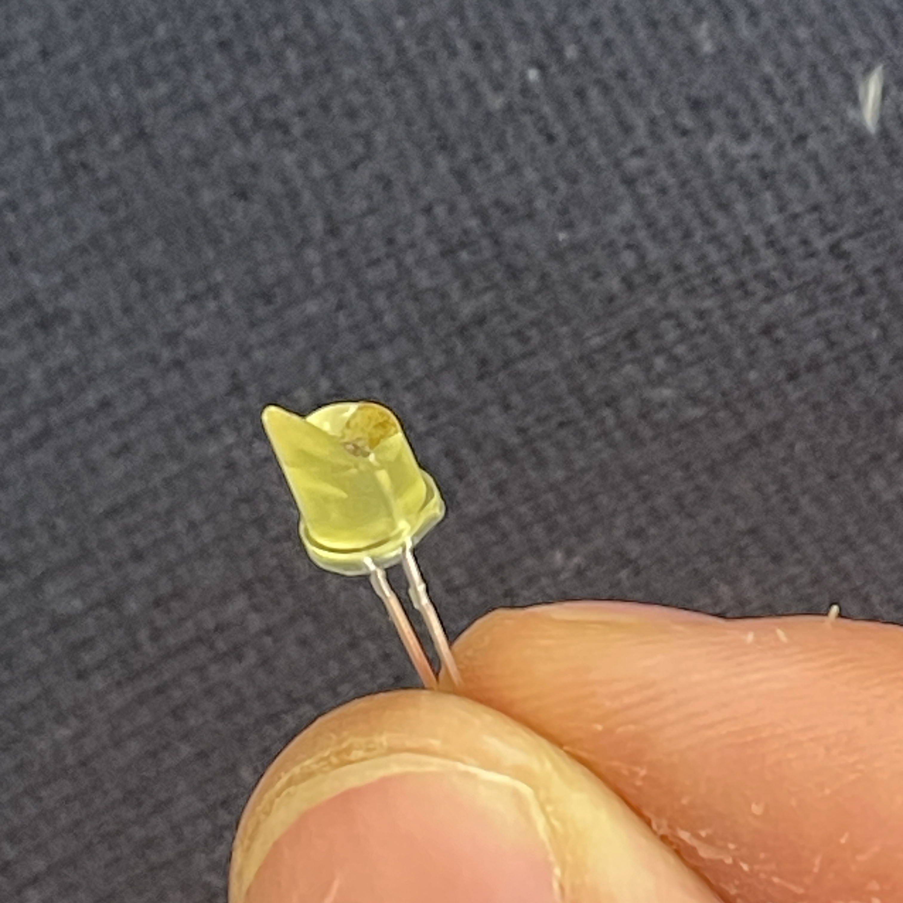 An exploded LED with a cracked plastic top