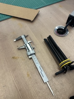 Digital caliper reading material thickness