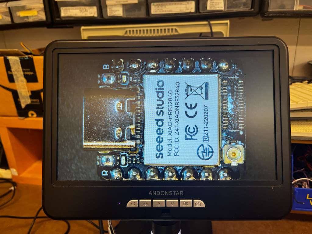 XIAO ESP32S3 with pins soldered for through hole mounting