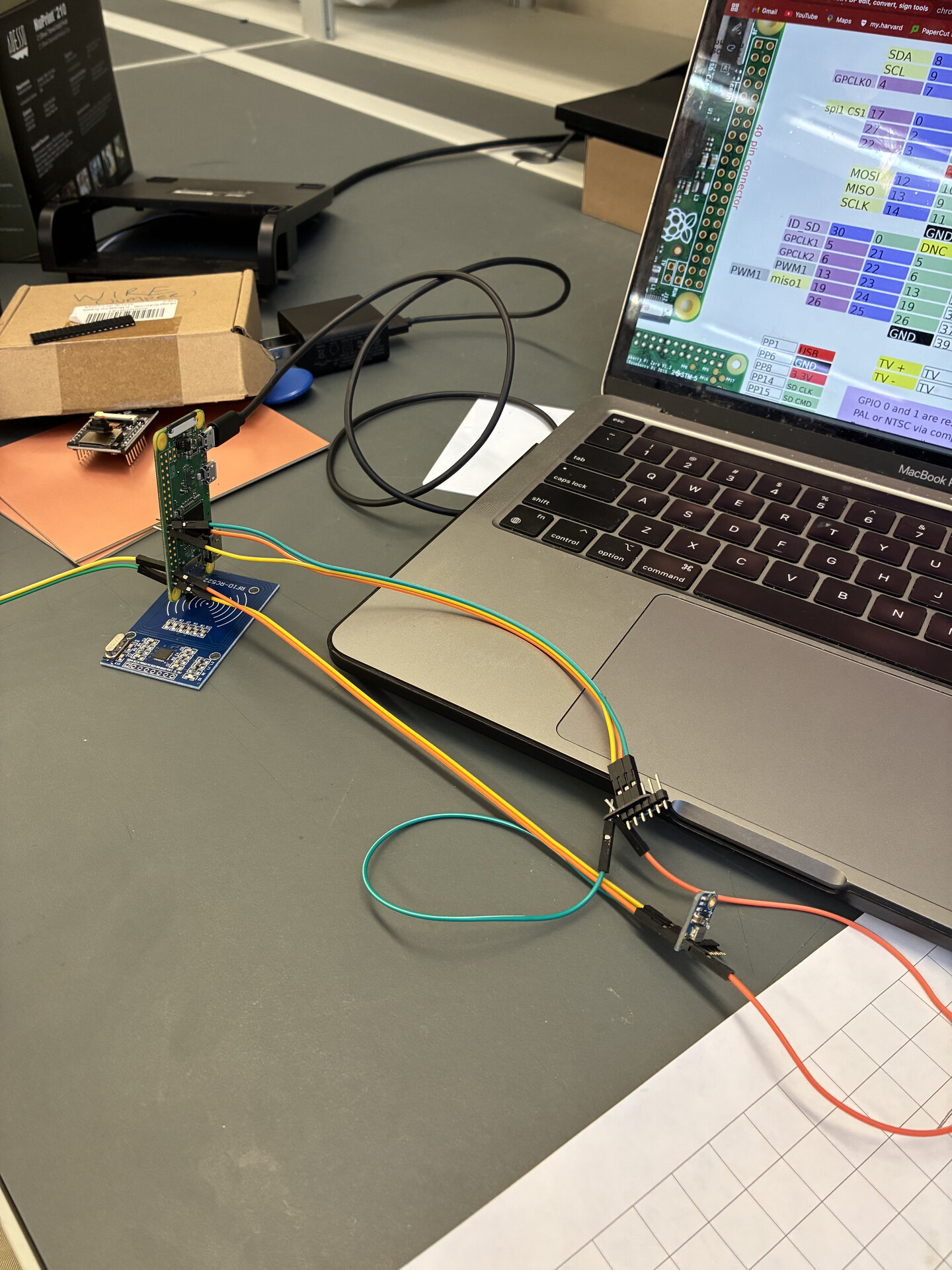 I have very limited electronics design experience, so this was really my first time working with a buck converter. I did not want to pull the power for all the peripherals from the Pi's onboard 3.3v rail and risk a brown out, so I stepped down the 5v using a buck converter and ran that into the RFID reader, as can be seen in this photo.