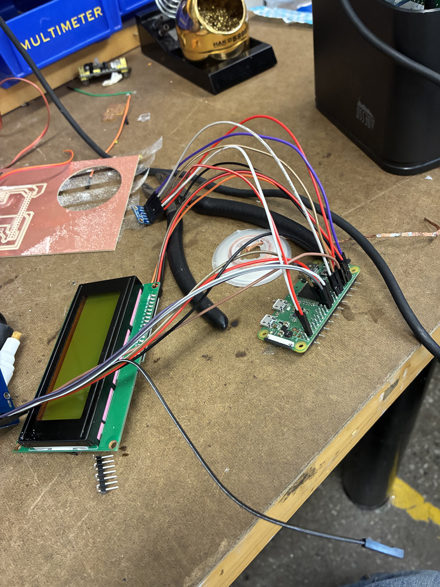 I started by prototyping with direct jumper wires before soldering in case any issues arose. Here is the first photo of my fully functional prototype. pictured is the Pi, LCD screen, RFID reader, microphone, and printer.