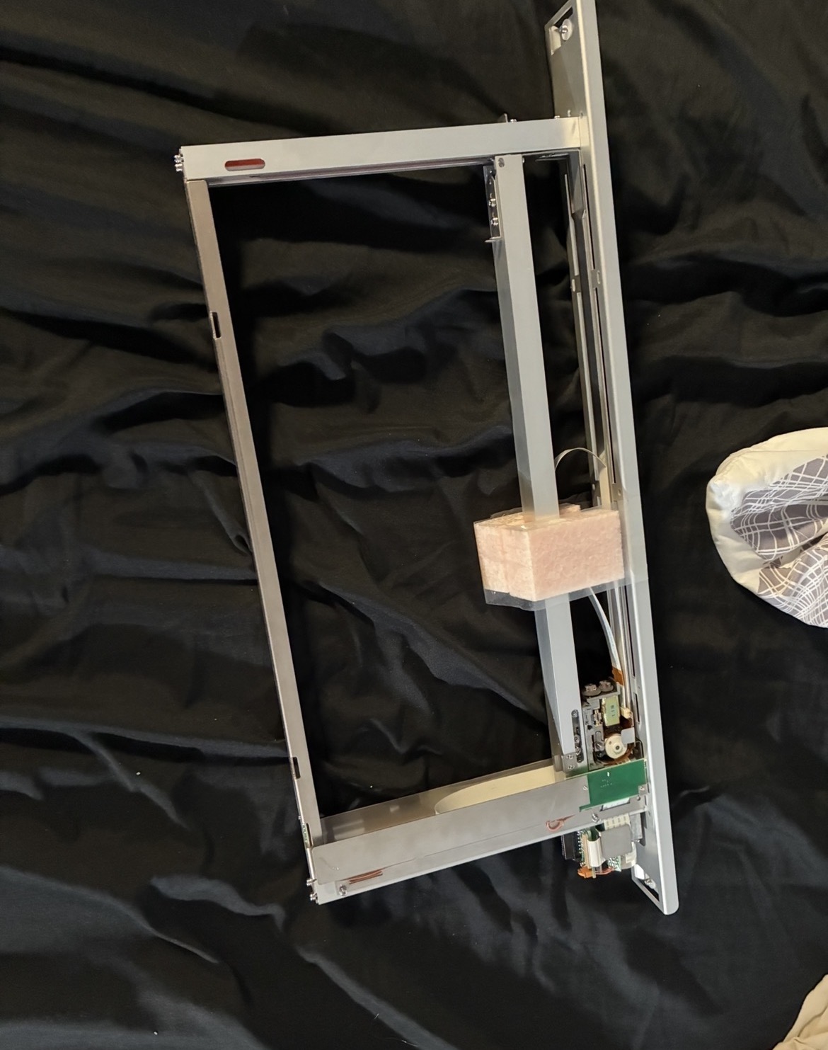 Scavenged AIO X-Y gantry setup from Stata docks, possibly from a server setup or robot. Unfortunately did not work with our dimensions and required drivers that we could not identify.
