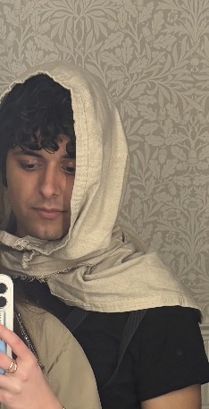 My copy of the costume at the cosplay event. I got a lot of compliments because people could tell the costume was somewhat tailored for my girlfriend and I. I also got stabbed in the neck by a green safety pin by the end of the day. Pros and cons.