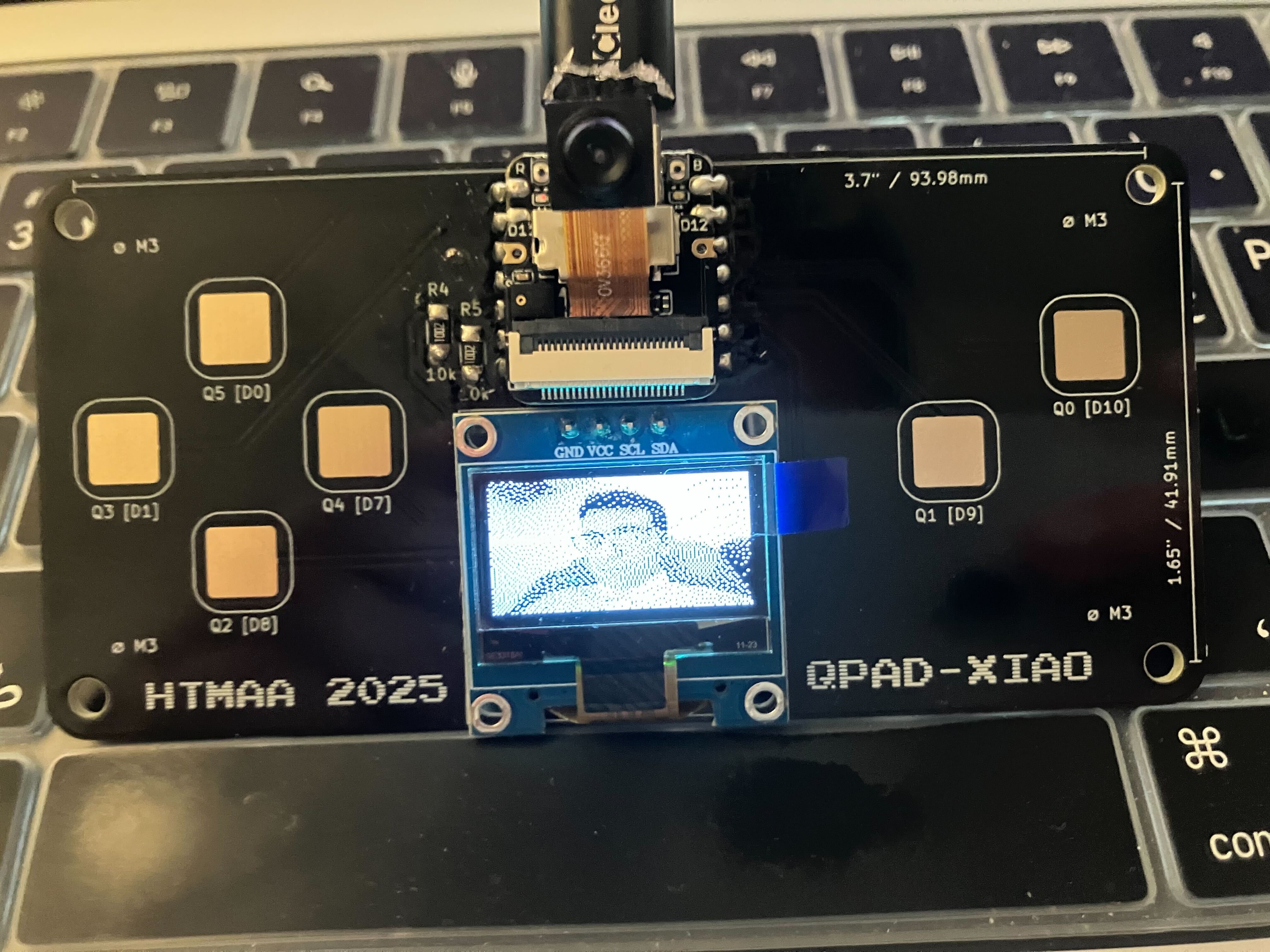 Successful camera capture showing bitmap display on OLED screen