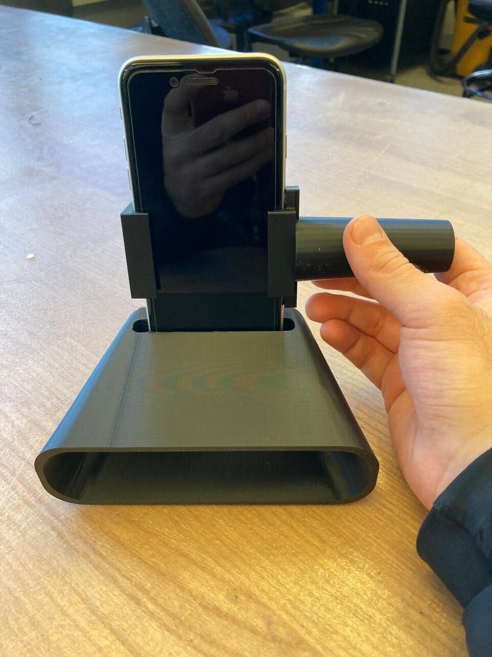 Refined phone holder and amplifier print