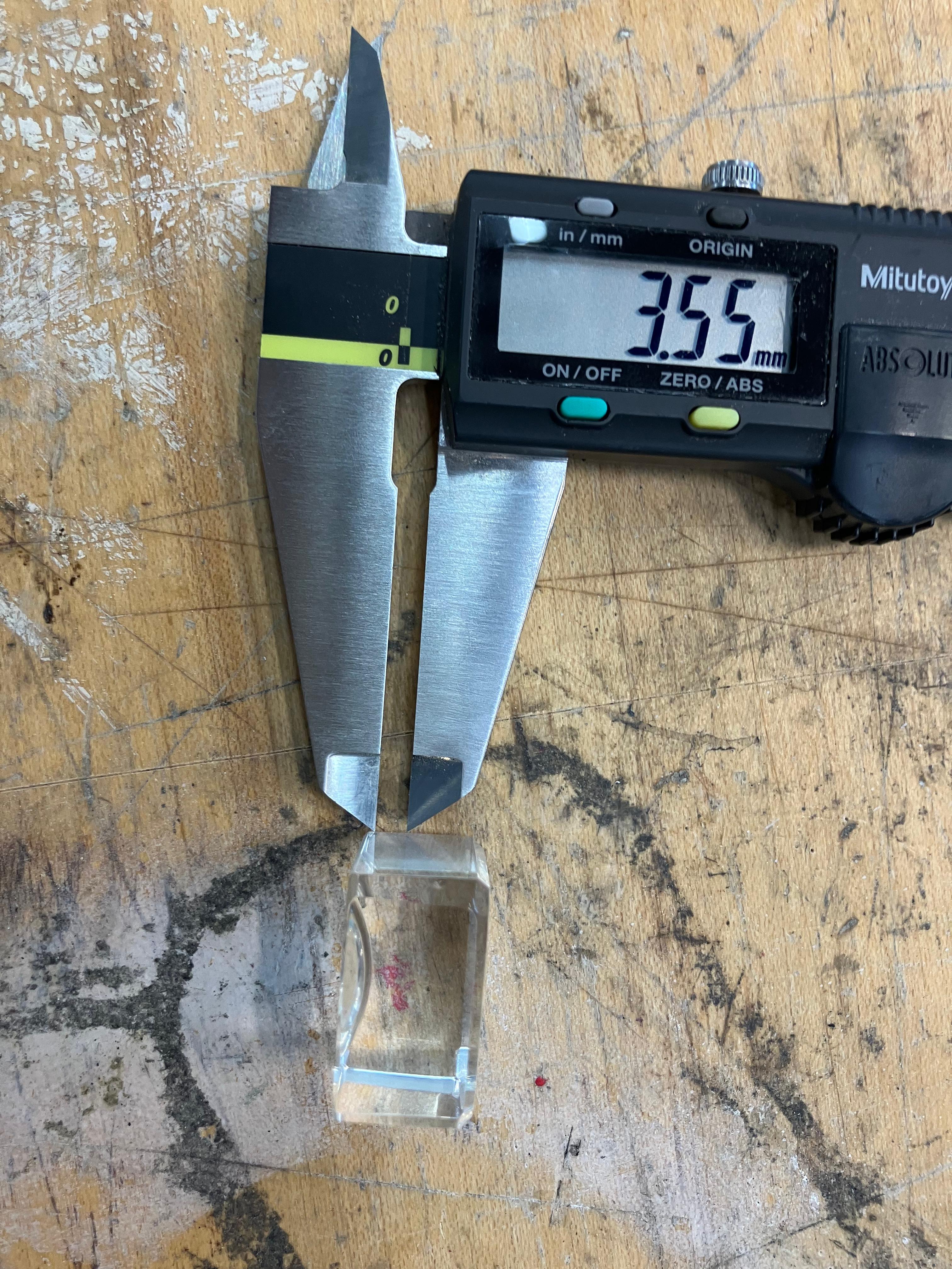 Small engraved heart showing scale