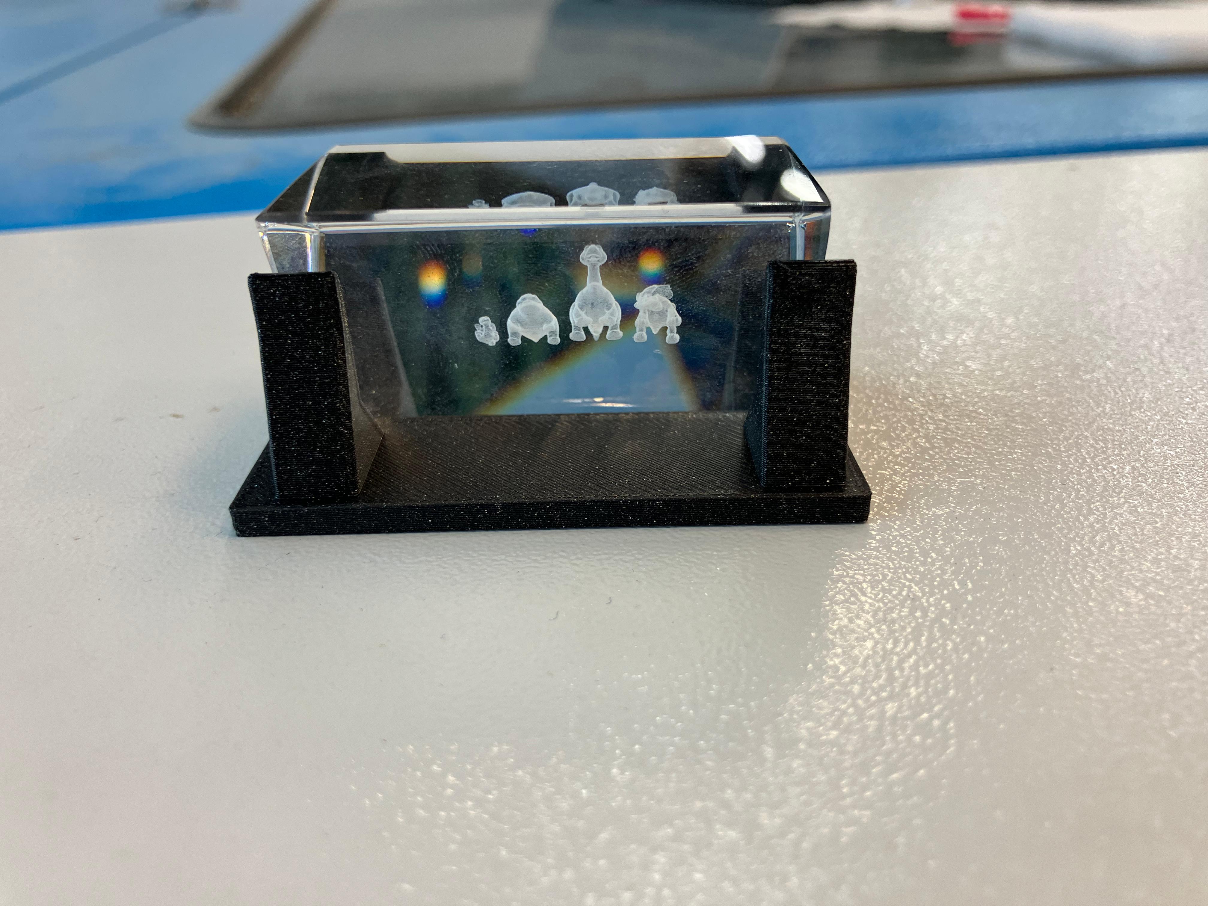 Completed dinosaur engravings in glass