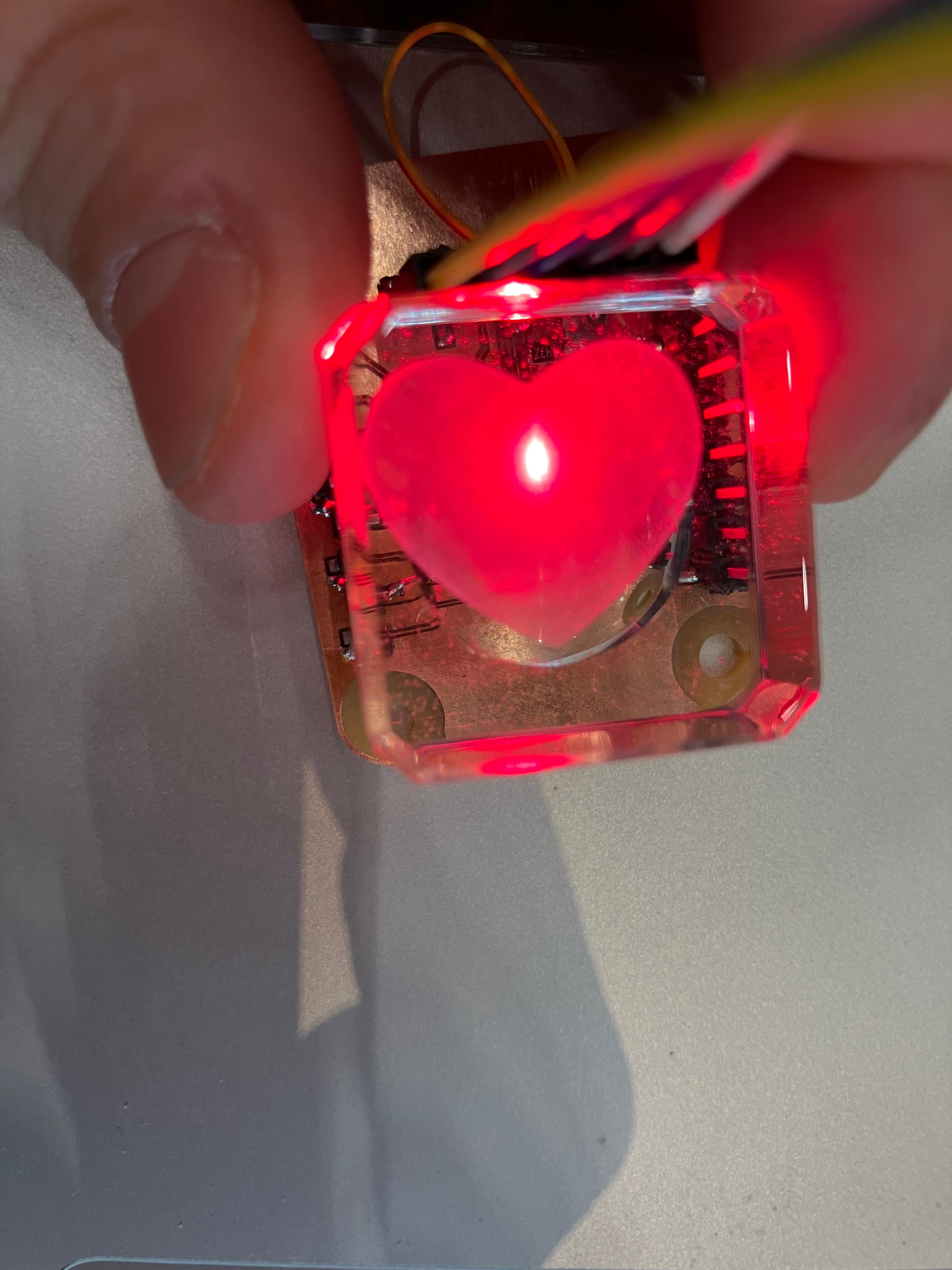 Tiny heart engraving in glass