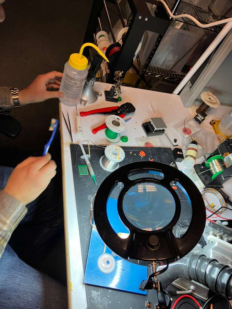 Cleaning PCB with IPA and toothbrush