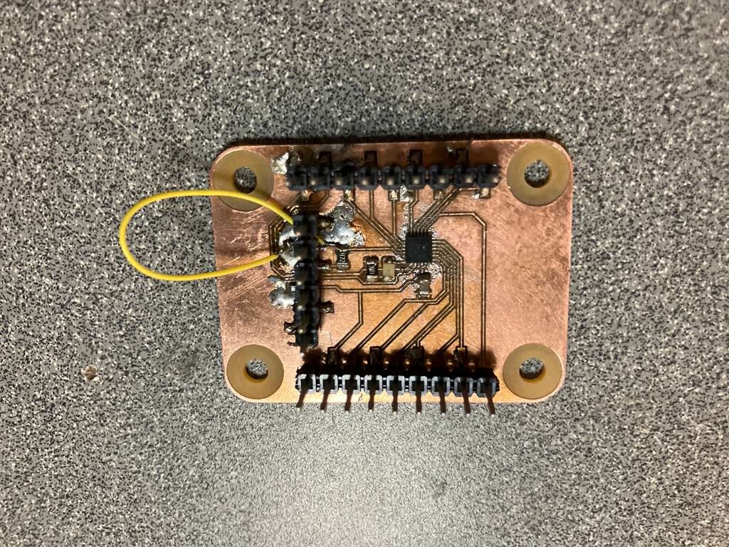 Fully assembled ATtiny1626 development board with all components soldered