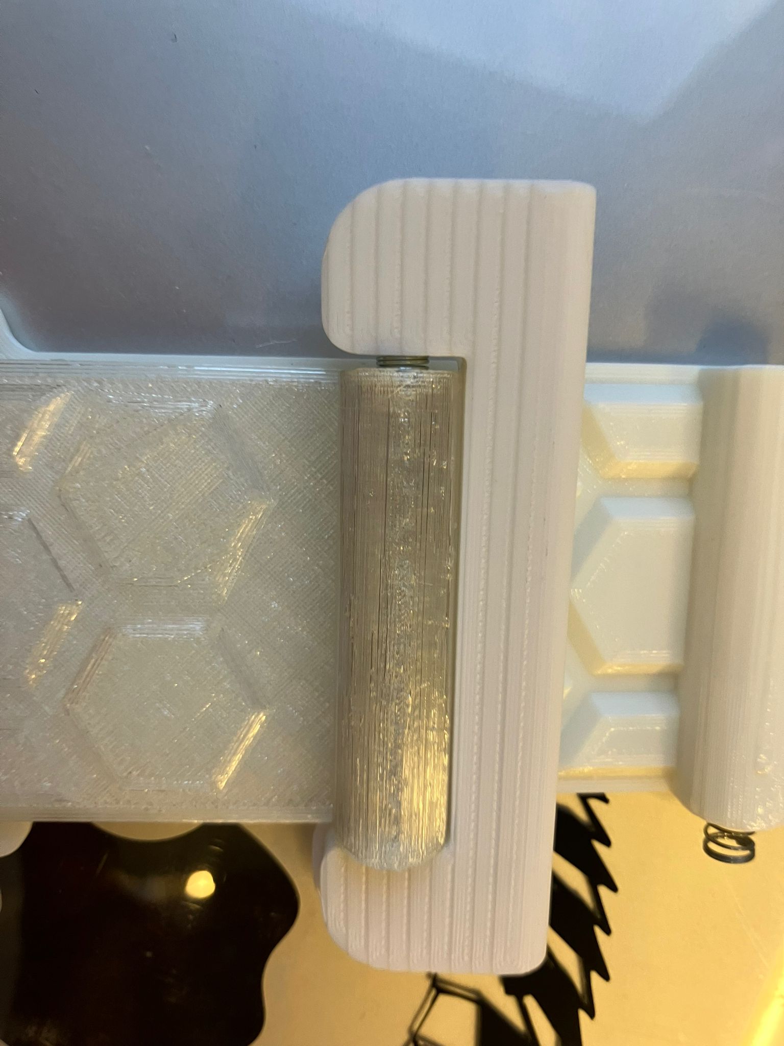 Spring-loaded interlock mechanism detail