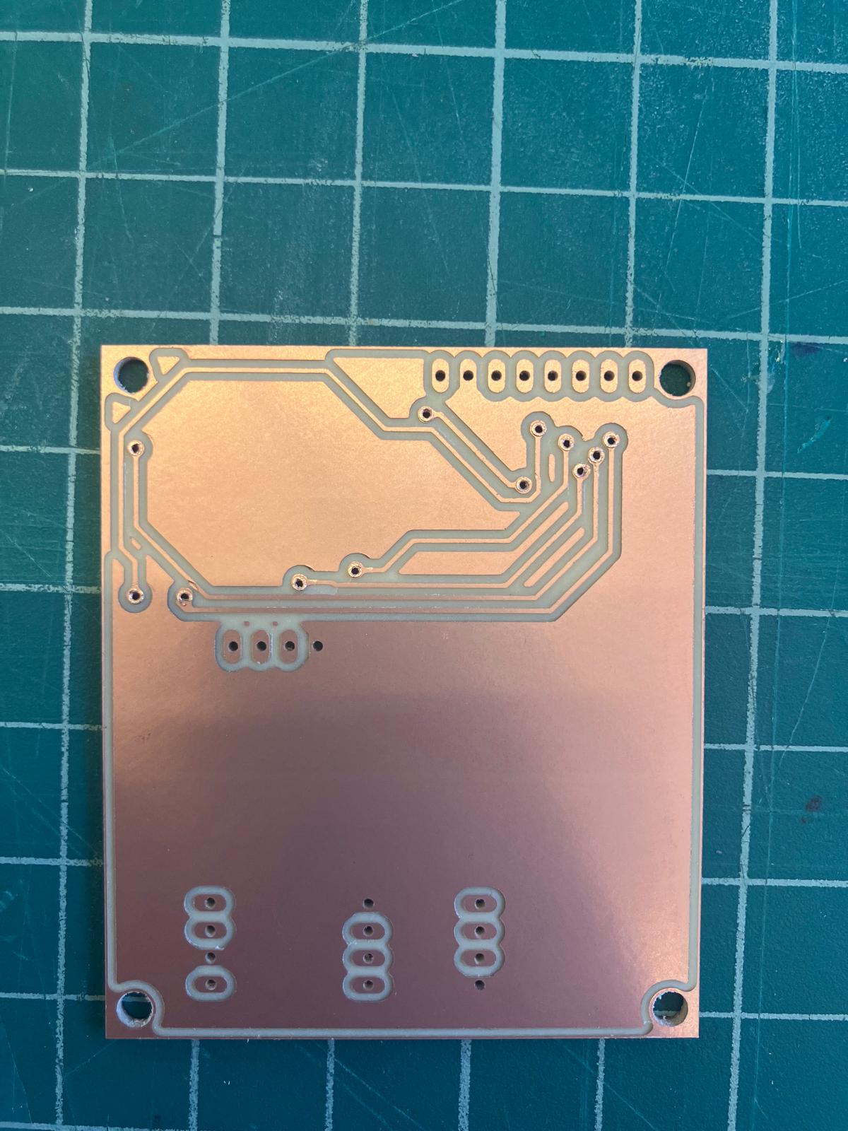 Aging clock board back side showing completed rivets