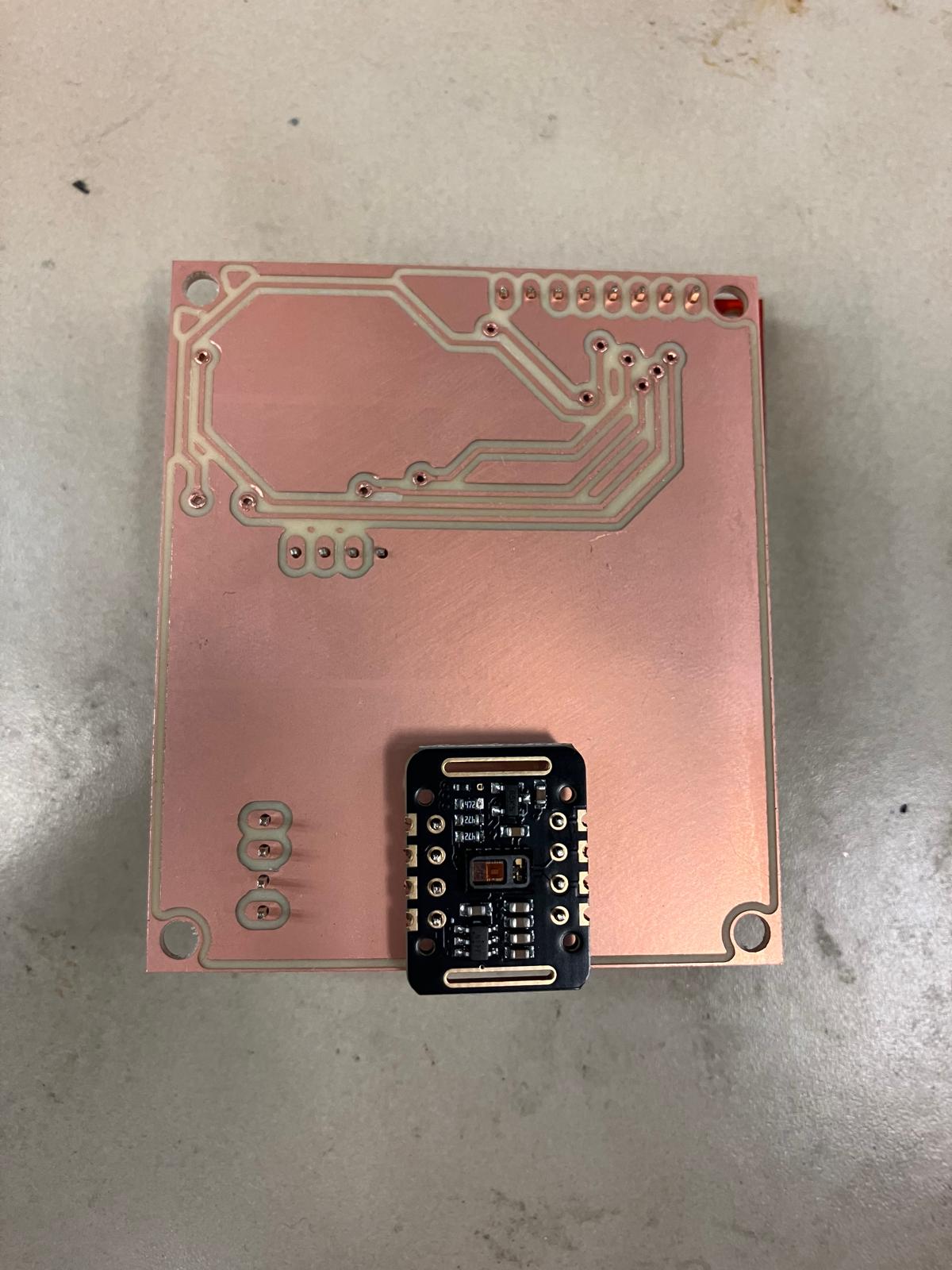 Back-side component placement for aging clock board