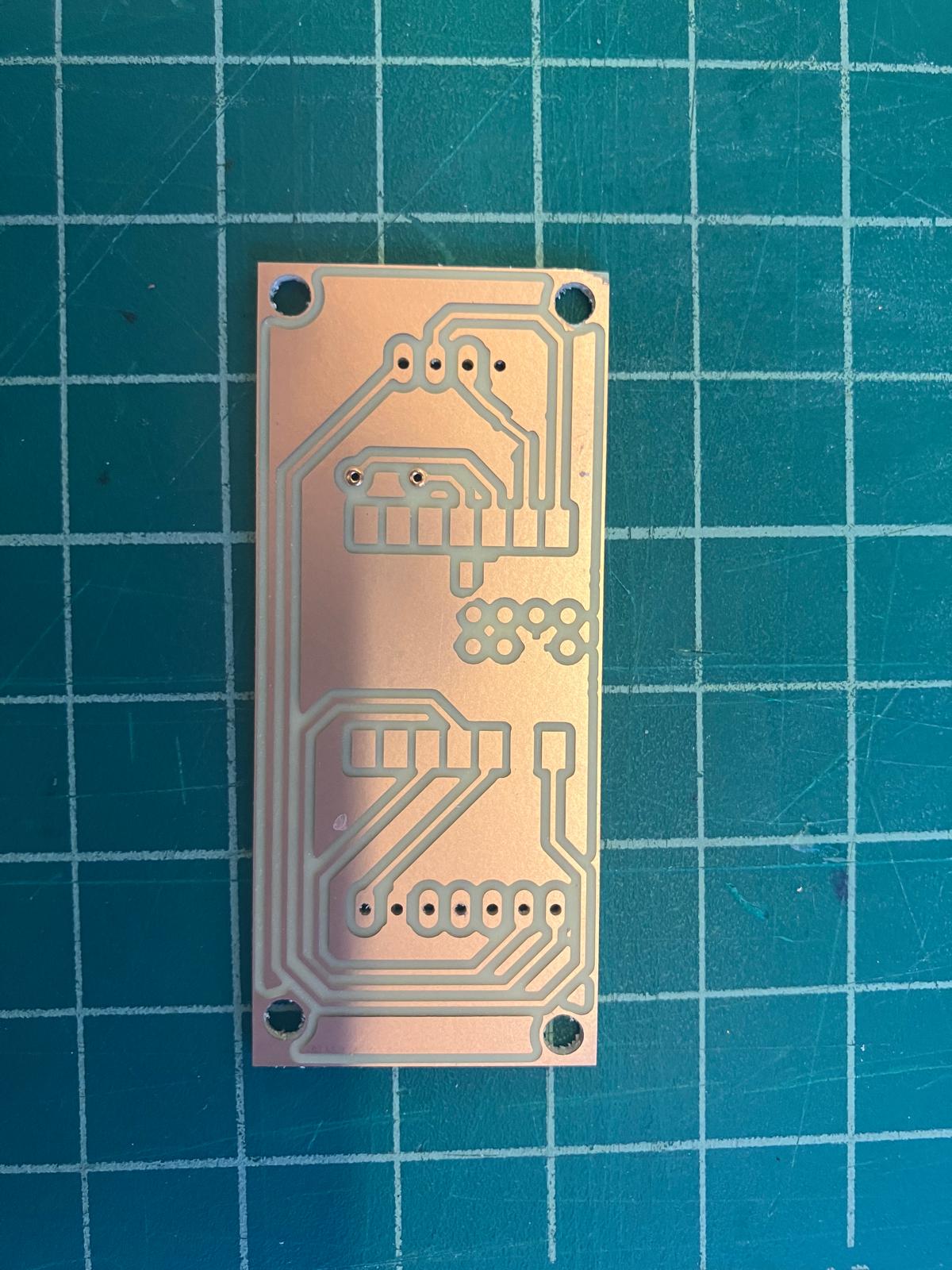 Small MirrorAge variant board with completed front-side rivets
