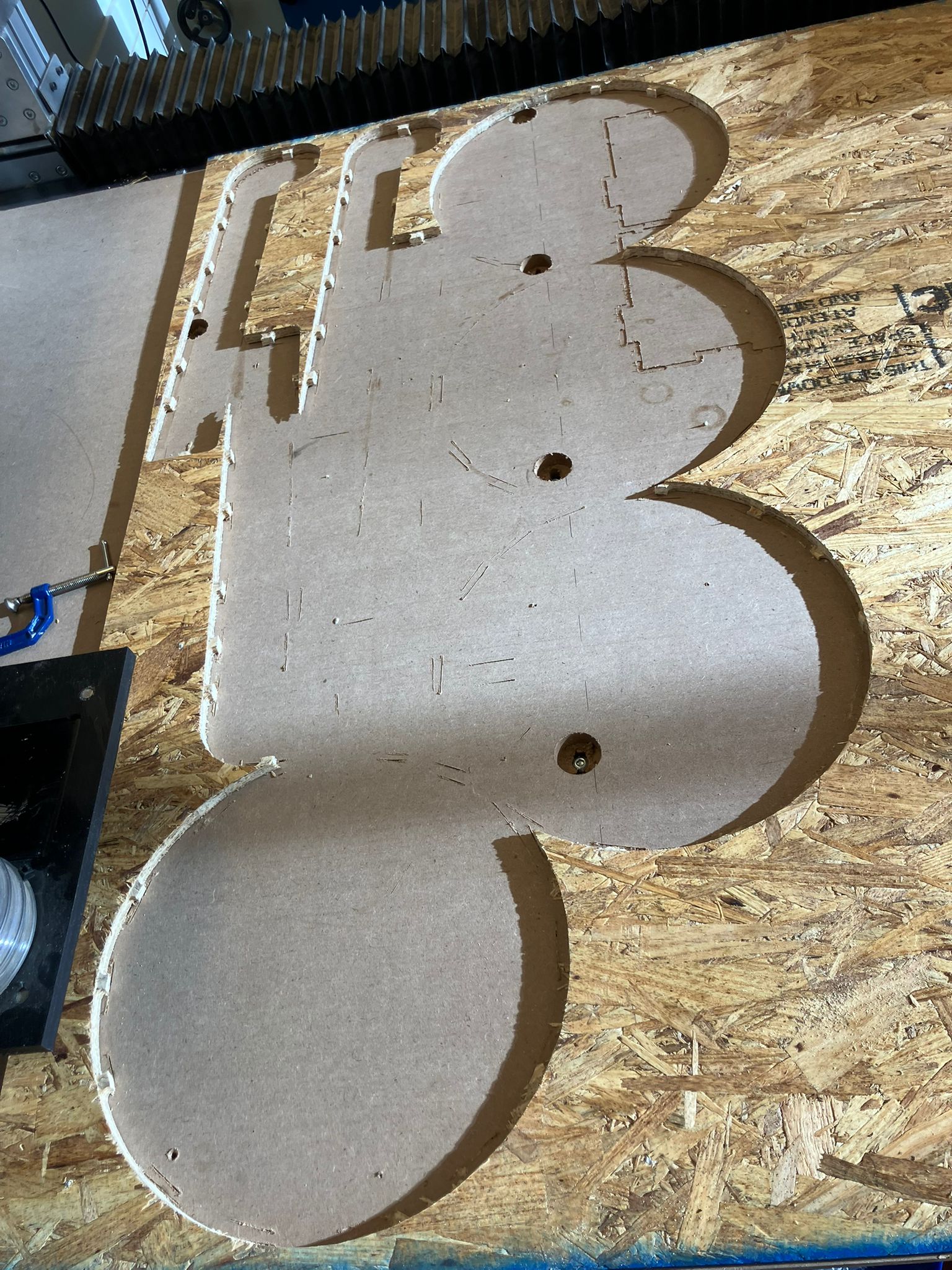 Vacuuming bed after part removal