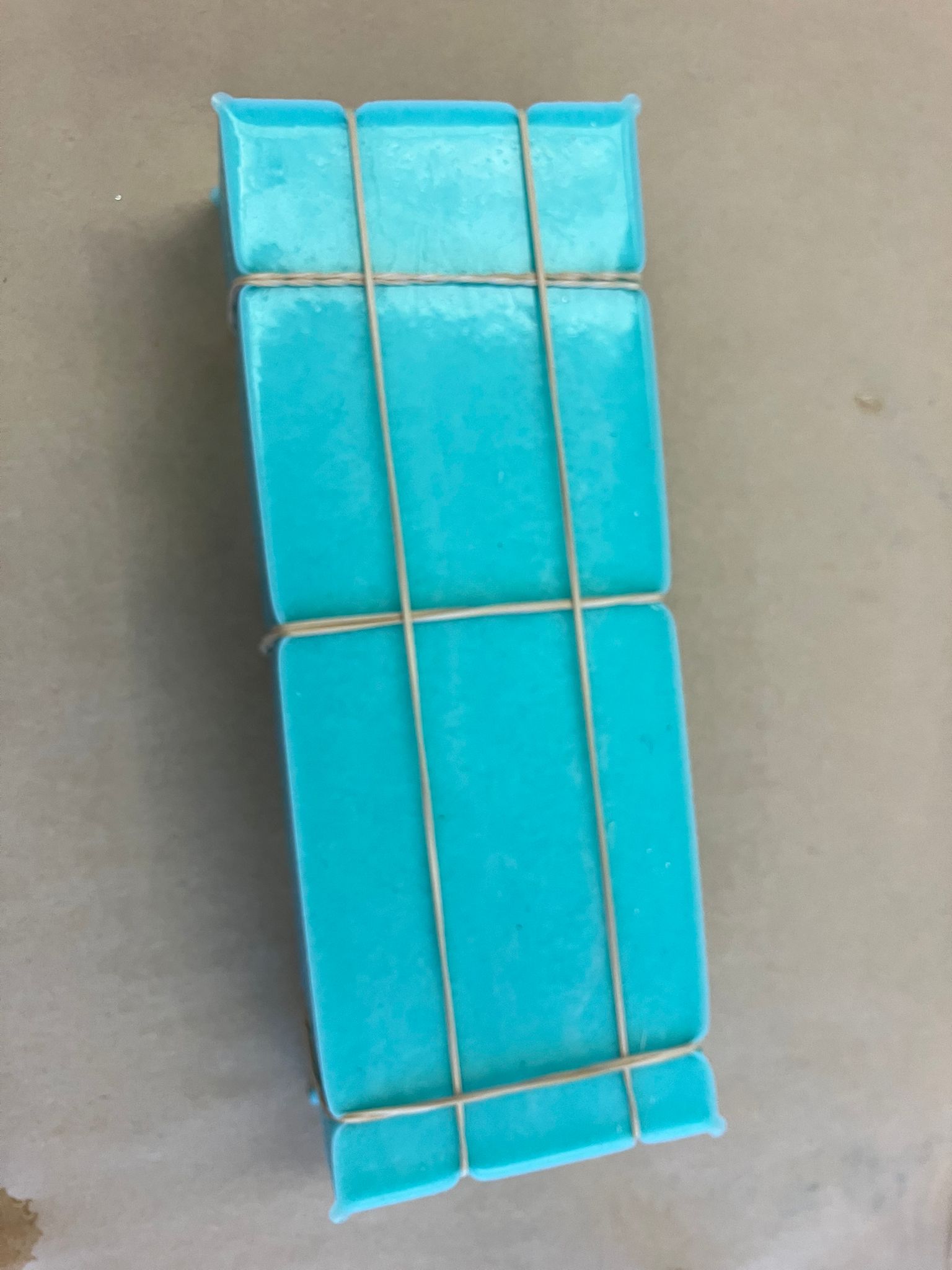 Silicone arrow molds secured with bands before casting