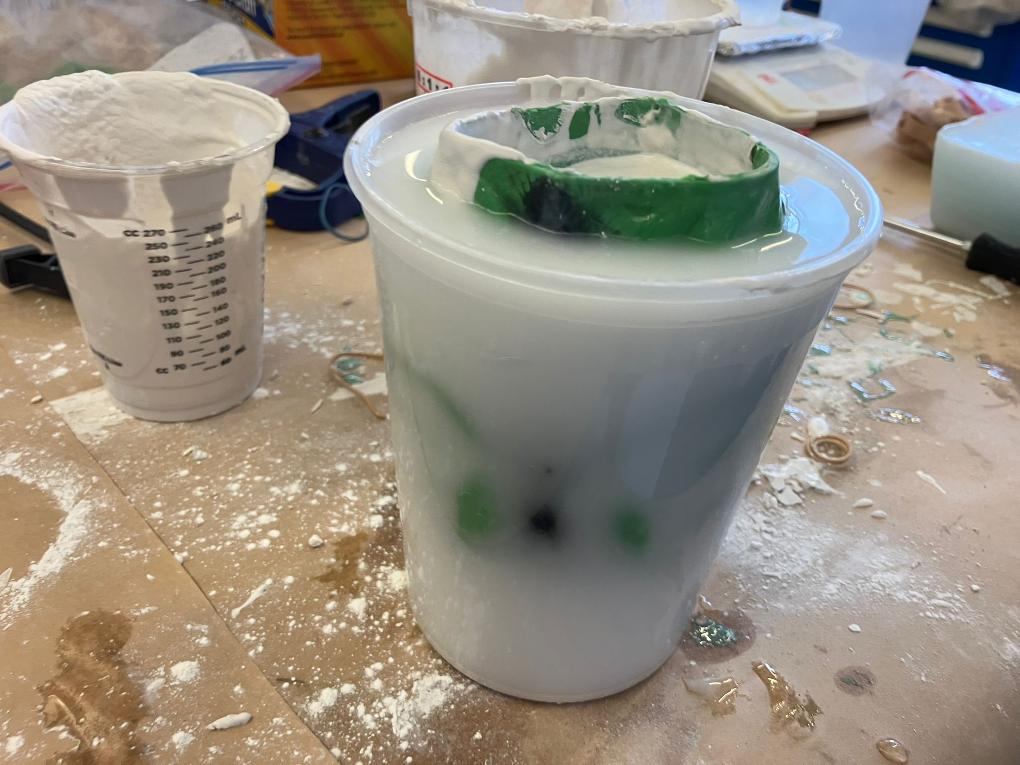 Dinosaur mold filled with casting material