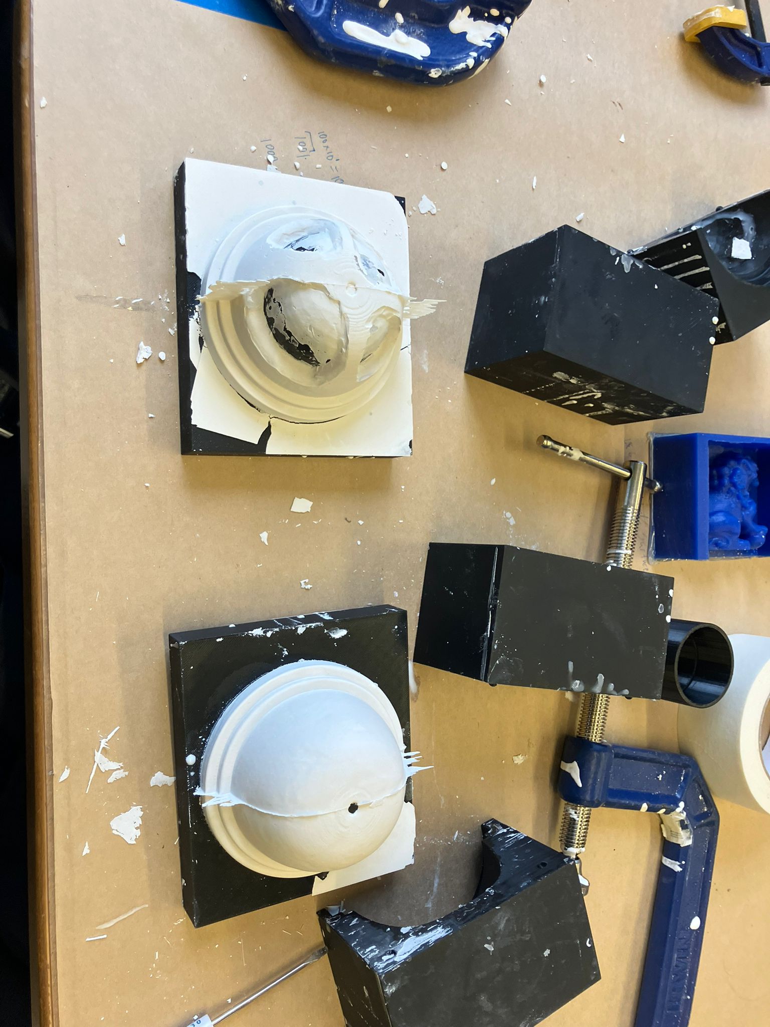 Putty knife staggered between right and left dome molds