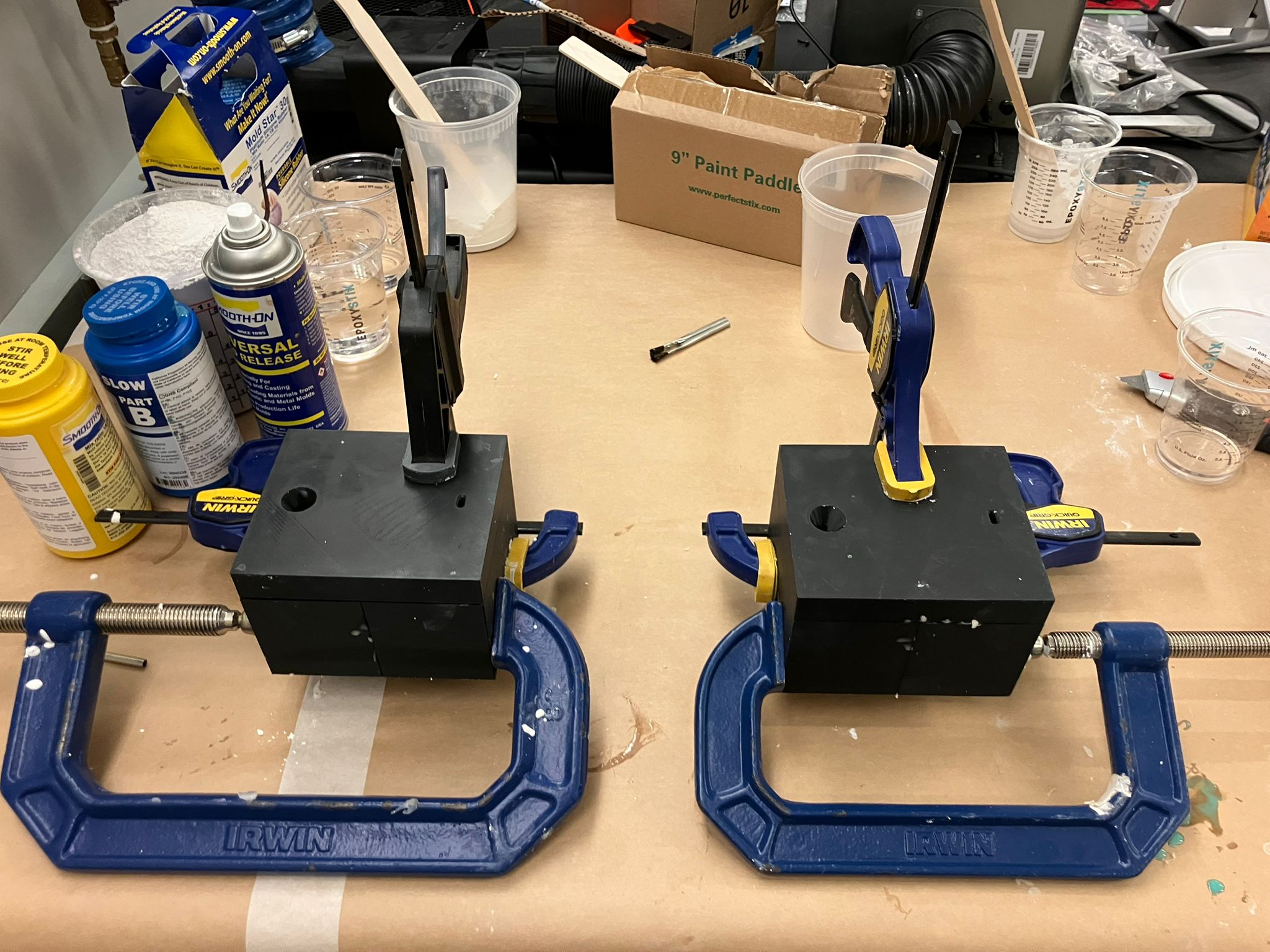 Triple-clamped dome molds leveled on the bench